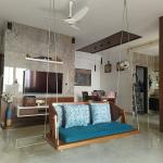 Premium Indoor Wooden Hanging Swing Sofa with Teal Cushions